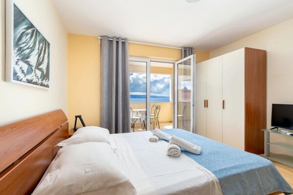 Foto van Premium One Bedroom Apartment with Sea View and Terrace - BedRoom
