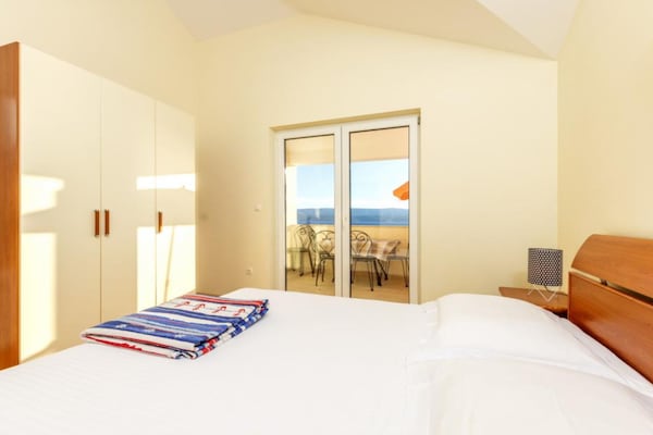 Foto van Premium Two Bedroom Apartment with Sea View and Terrace - BedRoom