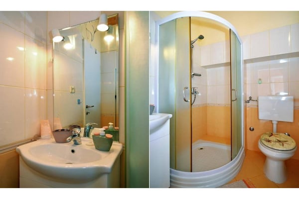 Foto van 1 slaapkamer appartement met zeezicht - Vakantiehuis in Murter - BathRoom