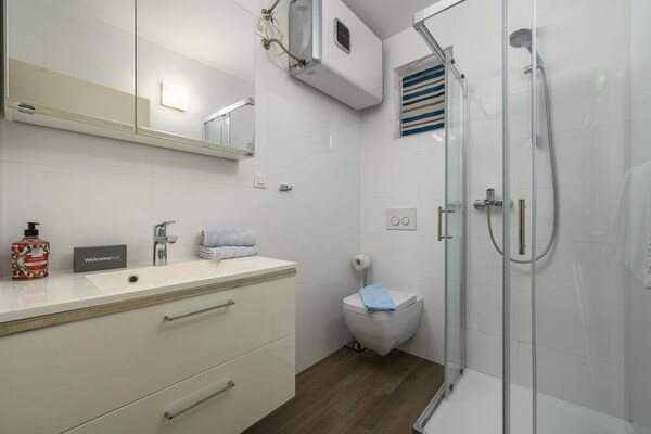 Foto van Appartement in Poreč bij zandstrand - Vakantiehuis in Porec - BathRoom