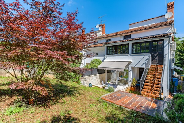 Foto van Appartement in Poreč bij zandstrand - Vakantiehuis in Porec - ExteriorSummer