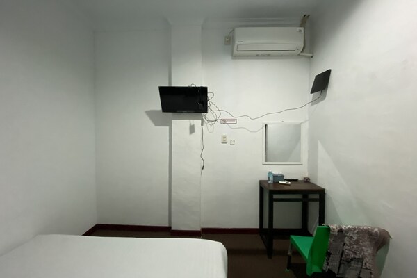 Foto van Quanza Hotel • Heritage Double - Vakantiehuis in Banda Aceh - BedRoom