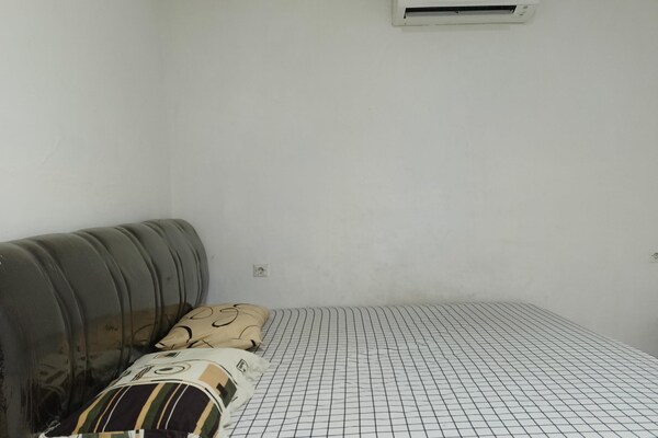 Foto van Slim Solo Verblijf in de Buurt van RSUD Haji - Vakantiehuis in Makassar - BedRoom