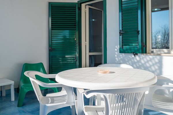 Foto van Sfeervol appartement in Policastro Bussentino met een balkon - TerraceBalcony