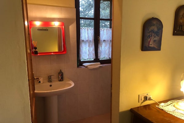 Foto van Boerderij in Paciano met Zwembad & Uitzicht - Vakantiehuis in Paciano - BathRoom