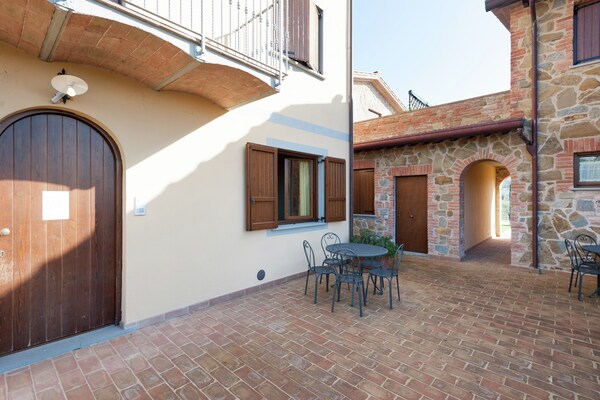 Foto van Appartement in Monte del Lago bij Trasimeno - Vakantiehuis in Monte del Lago - TerraceBalcony