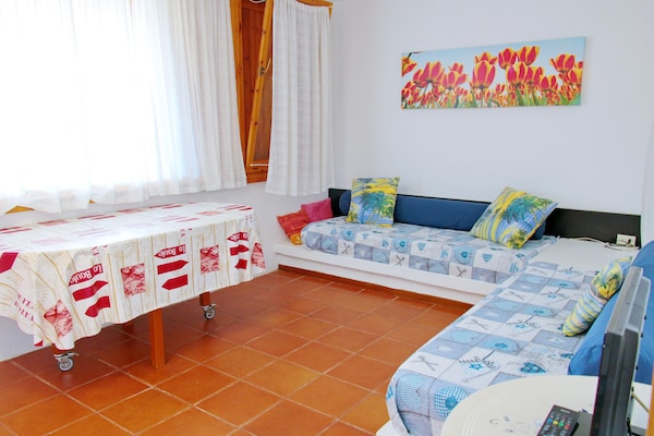 Foto van Appartement op Sardinië met zeezicht - Vakantiehuis in Olbia - LivingRoom