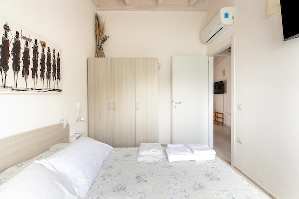Foto van Zolder met terrazza en zwembad condivisa - Vakantiehuis in Badesi - BedRoom