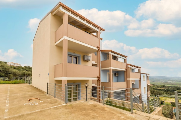 Foto van Zolder met terrazza en zwembad condivisa - Vakantiehuis in Badesi - ExteriorSummer