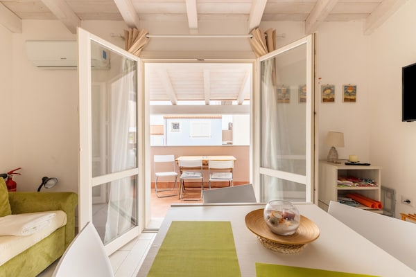 Foto van Zolder met terrazza en zwembad condivisa - Vakantiehuis in Badesi - DiningRoom