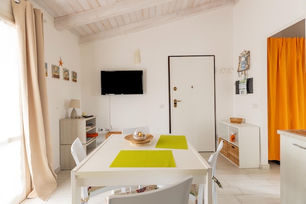 Foto van Zolder met terrazza en zwembad condivisa - Vakantiehuis in Badesi - DiningRoom