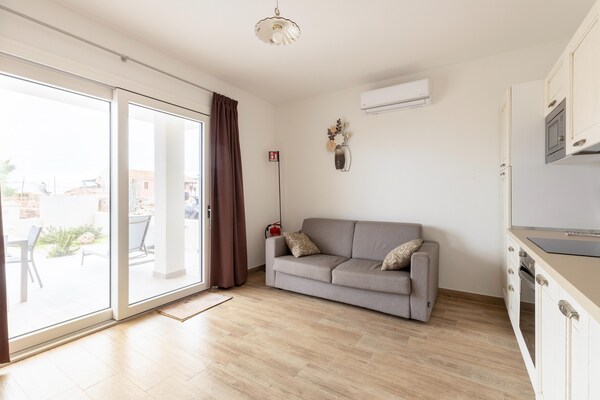 Foto van Giardino, aria condizionata, een passi dal-merrie - Vakantiehuis in Castelsardo - LivingRoom