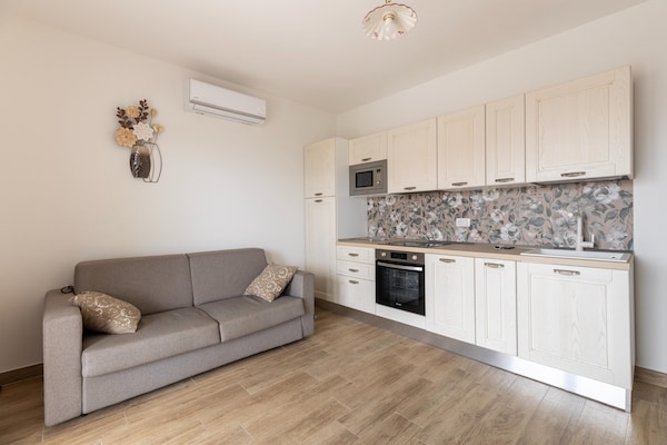 Foto van Giardino, aria condizionata, een passi dal-merrie - Vakantiehuis in Castelsardo - LivingRoom