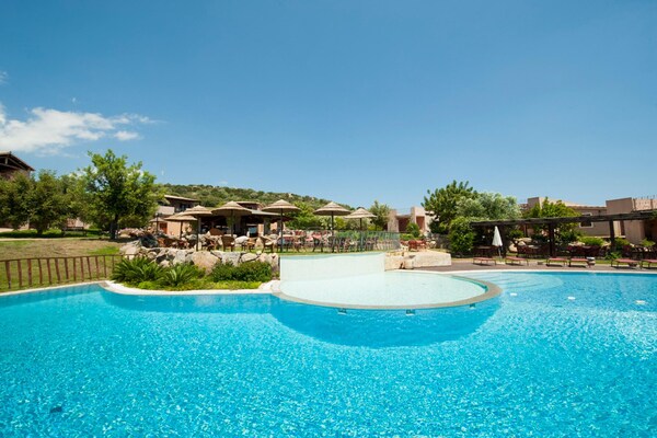 Foto van Tweekamerappartement in een complex - Vakantiehuis in Villasimius - PoolOfHouse
