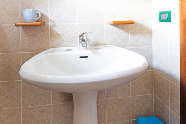 Foto van Wonen aan het meer met avontuur - Vakantiehuis in Idro - BathRoom
