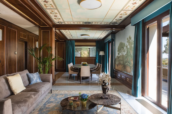 Foto van Premium vakantiehuis met zwembad - Vakantiehuis in Castel San Pietro Terme - LivingRoom