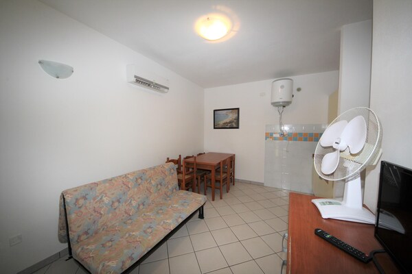 Foto van Twee slaapkamerappartement in Rosolina met ruimte - Vakantiehuis in Rosolina Mare RO - LivingRoom
