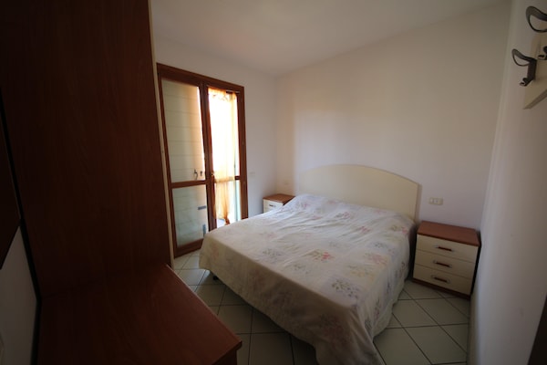 Foto van Twee slaapkamerappartement in Rosolina met ruimte - Vakantiehuis in Rosolina Mare RO - BedRoom