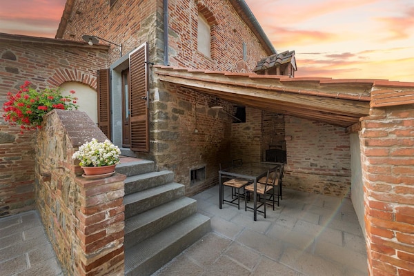 Foto van Boerderij in Toscane met zwembad en uitzicht - Vakantiehuis in Cortona - Landing