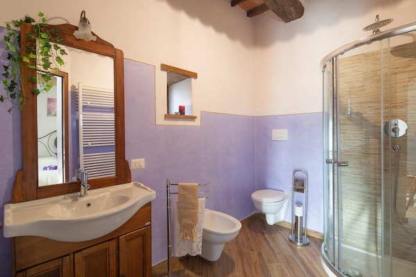 Foto van Boerderij in Toscane met zwembad en uitzicht - Vakantiehuis in Cortona - BathRoom