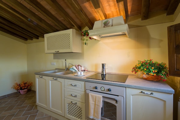 Foto van Boerderij in Toscane met zwembad en uitzicht - Vakantiehuis in Cortona - Kitchen