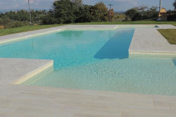 Foto van Boerderij in Toscane met zwembad en uitzicht - Vakantiehuis in Cortona - PoolOfHouse