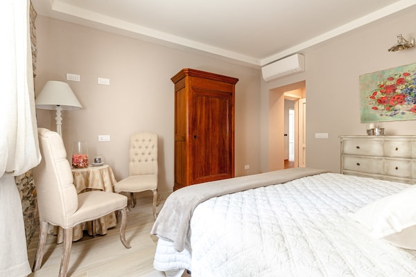 Foto van Boerderij bij Lucca met Zoutwaterzwembad - Vakantiehuis in Capannori - BedRoom