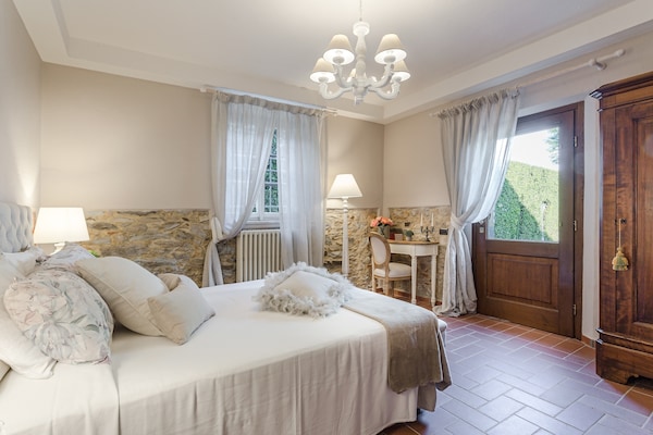 Foto van Boerderij bij Lucca met Zoutwaterzwembad - Vakantiehuis in Capannori - BedRoom