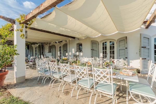 Foto van Toscaanse boerderij met prachtig uitzicht - Vakantiehuis in Capannori - TerraceBalcony