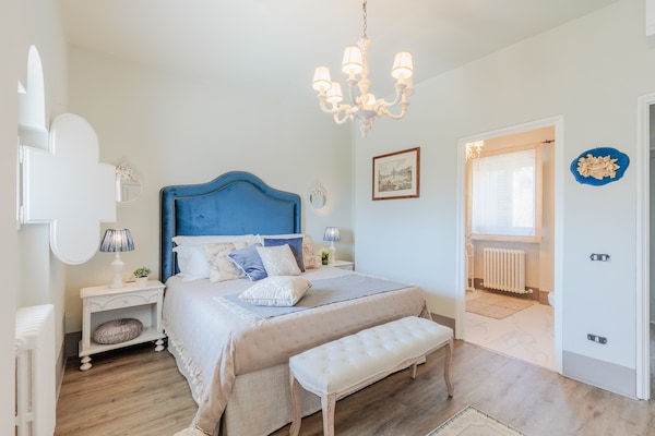 Foto van Toscaanse boerderij met prachtig uitzicht - Vakantiehuis in Capannori - BedRoom
