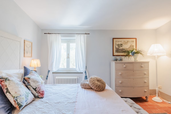 Foto van Toscaanse boerderij met prachtig uitzicht - Vakantiehuis in Capannori - BedRoom