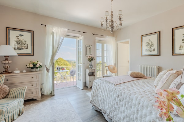 Foto van Toscaanse boerderij met prachtig uitzicht - Vakantiehuis in Capannori - BedRoom