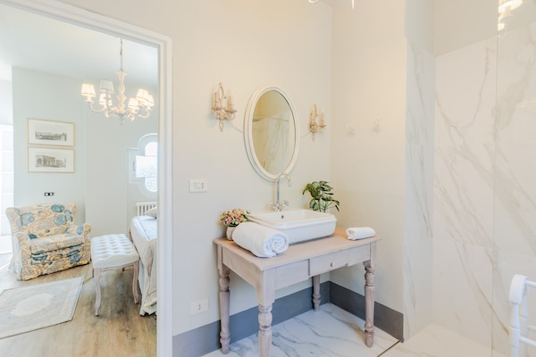 Foto van Toscaanse boerderij met prachtig uitzicht - Vakantiehuis in Capannori - BathRoom