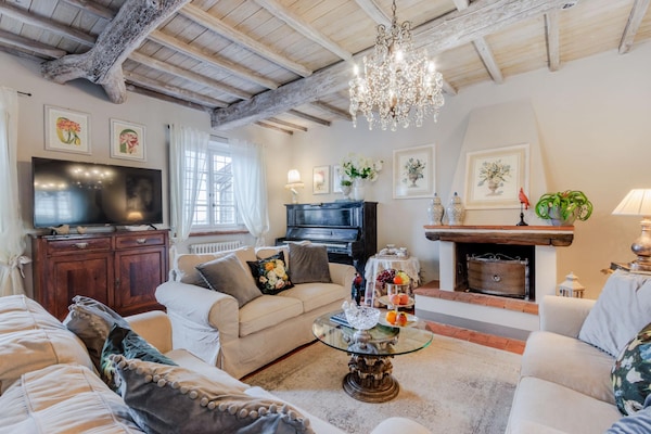Foto van Toscaanse boerderij met infinity pool - Vakantiehuis in Matraia - LivingRoom