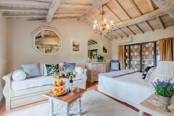 Foto van Toscaanse boerderij met infinity pool - Vakantiehuis in Matraia - BedRoom