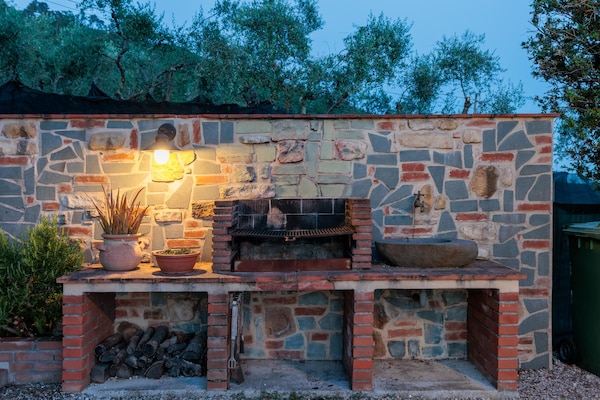 Foto van Villa met zwembad en uitzicht op de wijngaard - Vakantiehuis in Lucca - ExteriorSummer