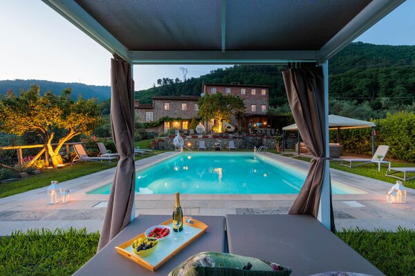 Foto van Villa met zwembad en uitzicht op de wijngaard - Vakantiehuis in Lucca - PoolOfHouse