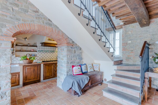 Foto van Villa met zwembad en uitzicht op de wijngaard - Vakantiehuis in Lucca - LivingRoom