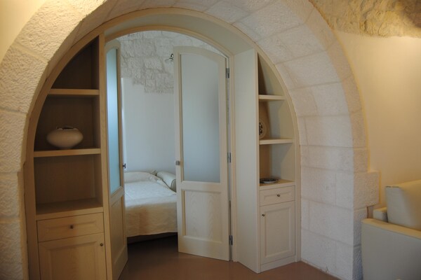 Foto van Trullo in Apulië met Privézwembad - Vakantiehuis in Cisternino - LivingRoom