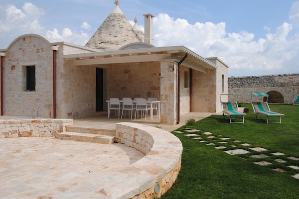 Foto van Trullo in Apulië met Privézwembad - Vakantiehuis in Cisternino - TerraceBalcony