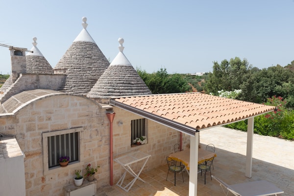 Foto van Vakantiehuis in Valle d'Itria met Zwembad - Vakantiehuis in Ostuni - TerraceBalcony