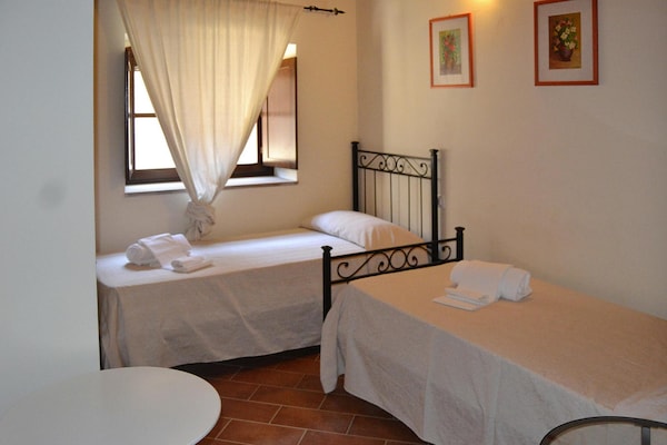 Foto van Antico Borgo Casalappi, appartementen in Campiglia Marittima - BedRoom