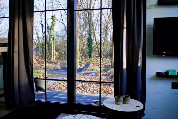 Foto van Tiny House in Hoogersmilde met tuin en parkeergelegenheid - LivingRoom