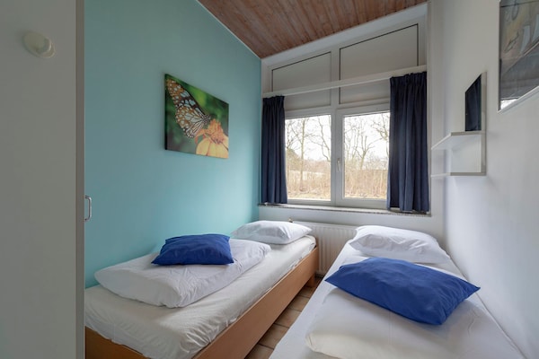 Foto van Ruim Duo bij de Duinen - Vakantiehuis in Sint Maartenszee - BedRoom