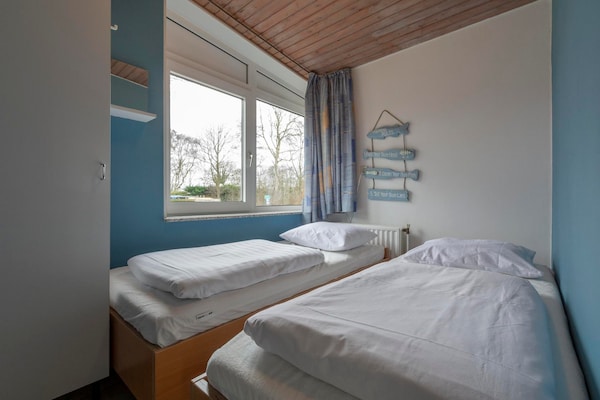 Foto van Ruim Duo bij de Duinen - Vakantiehuis in Sint Maartenszee - BedRoom