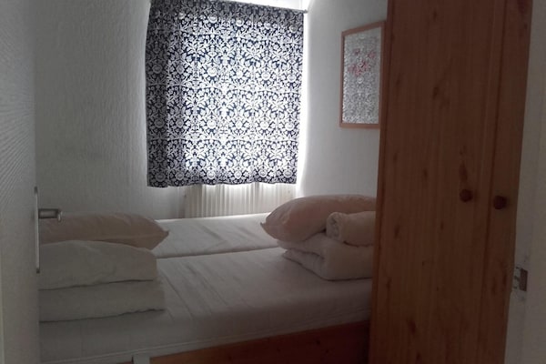 Foto van Leuke bungalow met zonnige tuin - Vakantiehuis in Sint Maartenszee - BedRoom