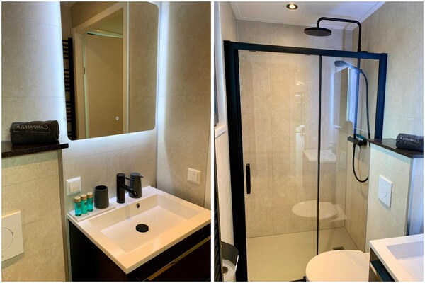 Foto van Aangenaam chalet met veranda - Vakantiehuis in Sint Maartenszee - BathRoom