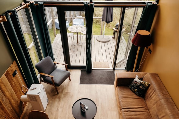 Foto van familie stranduitje - Vakantiehuis in Callantsoog - LivingRoom