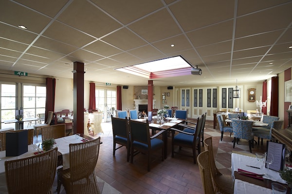 Foto van Chalet aan de Waddenzee met Tuin - Vakantiehuis in Hippolytushoef - ParkFacilities