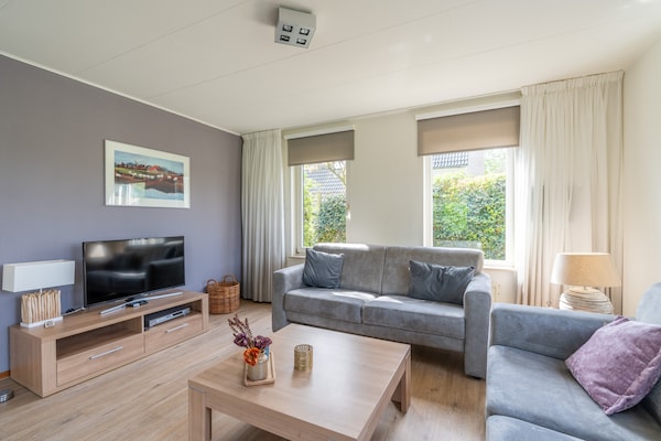 Foto van Sfeervolle villa met riante tuin aan het water - Vakantiehuis in De Koog - LivingRoom